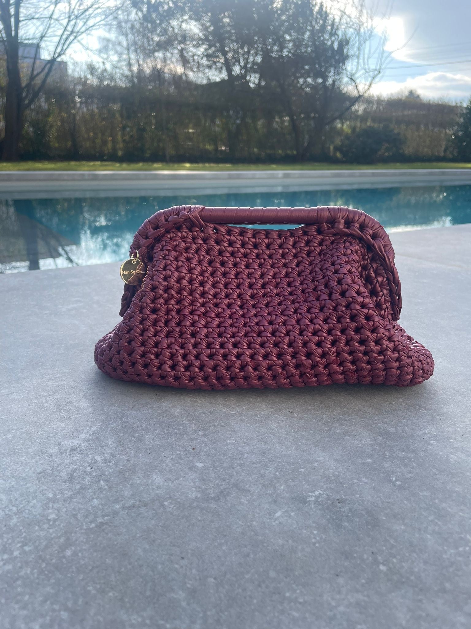 La pochette GEM imitation cuir bordeaux